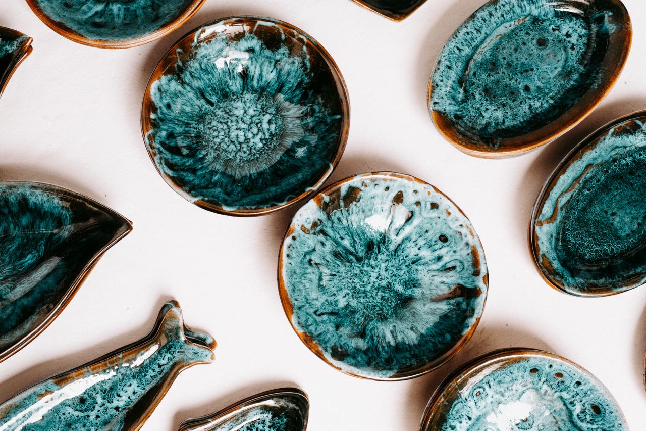 Close-up of glaze pooling on a ceramic surface